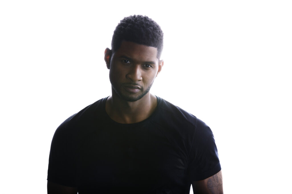 A photo of R&B singer Usher from his "Looking 4 Myself" era