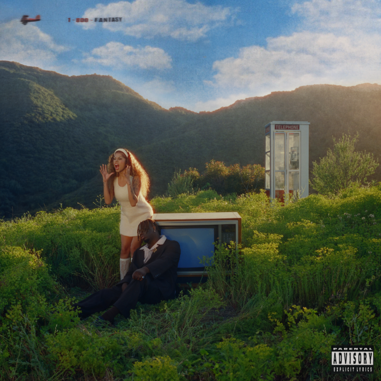 A cover art for BLK ODYSSY's album titled "1-800-FANTASY" featuring two individuals in a surreal outdoor setting. The scene includes lush green hills under a vibrant sky. One person wearing a white dress is standing and looking off into the distance, while the other, wearing a suit, sits on the ground with their head resting on a sideways old-fashioned tube television. Near them is a classic phone booth. The image includes the advisory notice "PARENTAL ADVISORY EXPLICIT CONTENT".