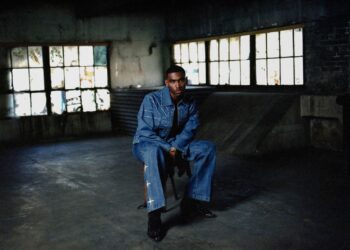 A photo of Jordan Hawkins wearing a denim outfit