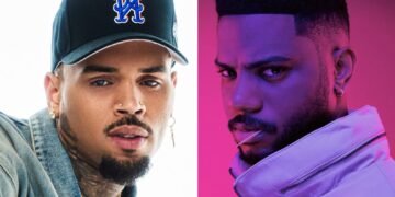 A photo of Chris Brown and Bryson Tiller