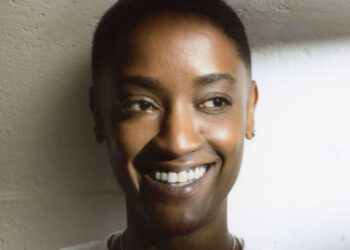A photo of singer Syd smiling